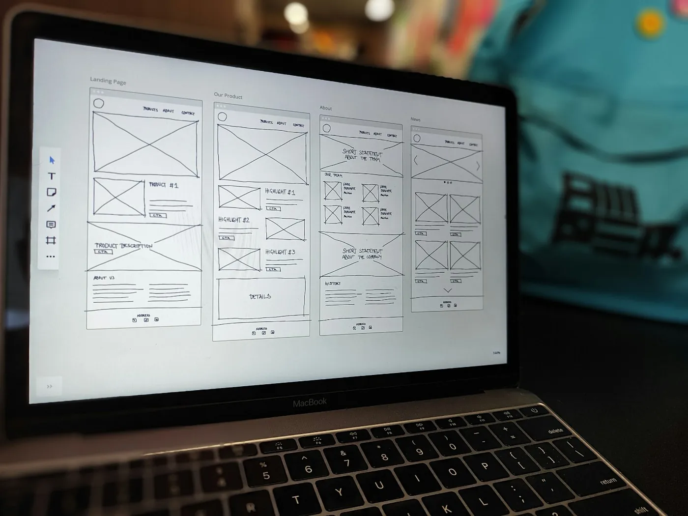 Laptop showing a landing page wireframe